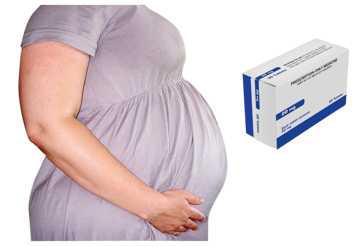 Pregnant woman with a box of tablets