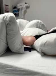 Patient in bed with heels free of presure